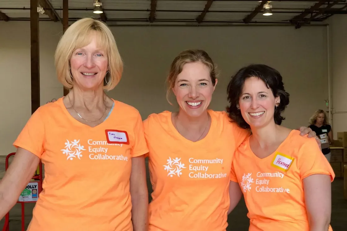 CEC staff together in Community Equity Collaborative shirts