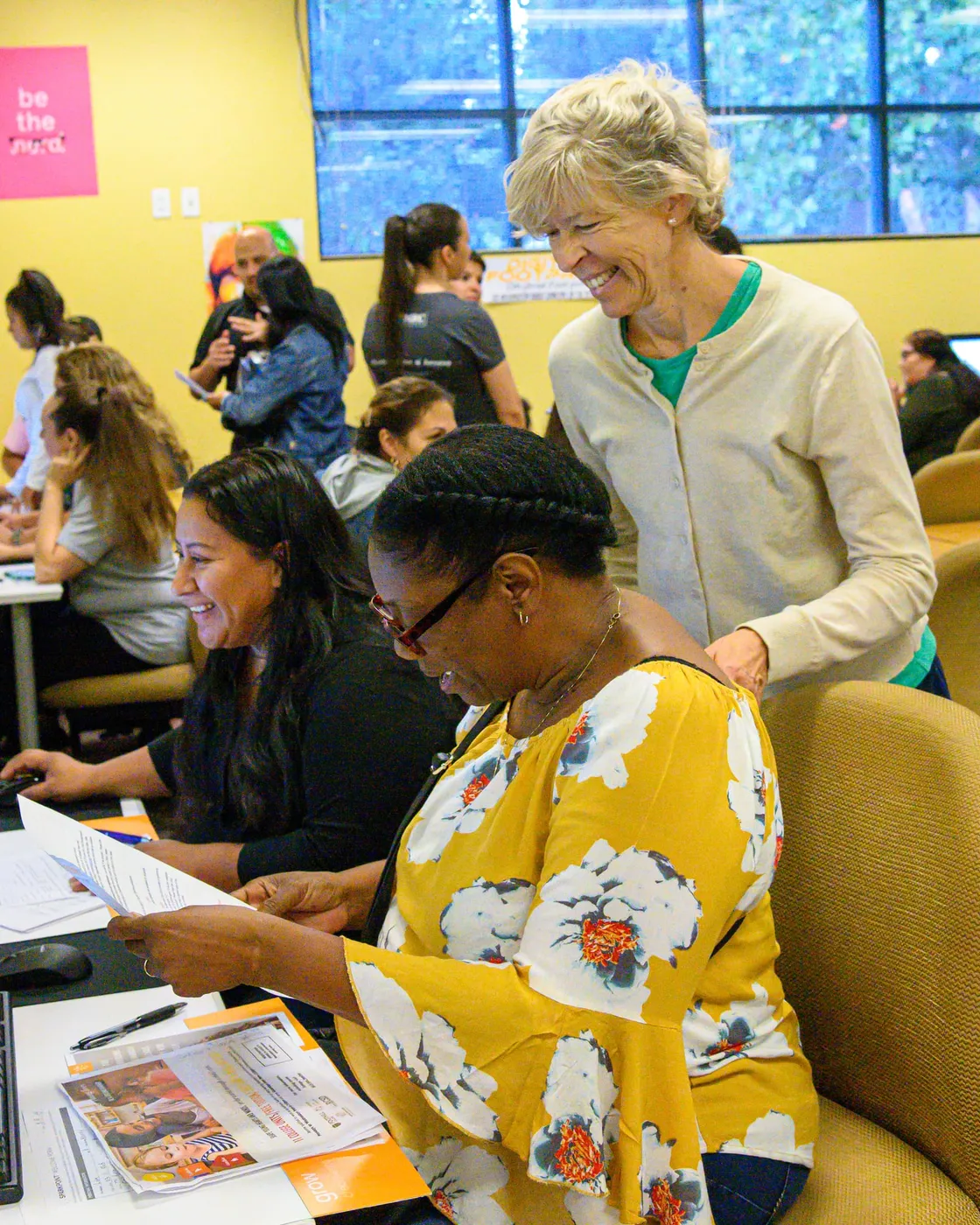 Teacher Pipeline participants reviewing course materials together